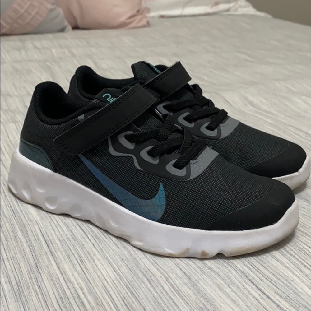 Size 12.5 - Kids Nike Explore Strada shoes.